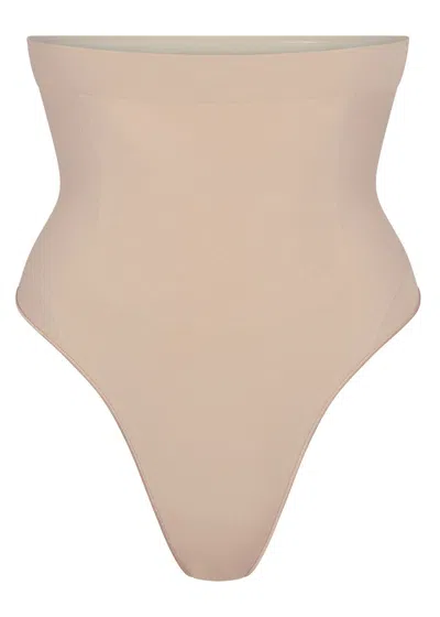 Skims Seamless Sculpt High-waisted Thong In Neutral