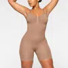 Skims Seamless Sculpt Strapless Mid Thigh Bodysuit In Sienna In Gold