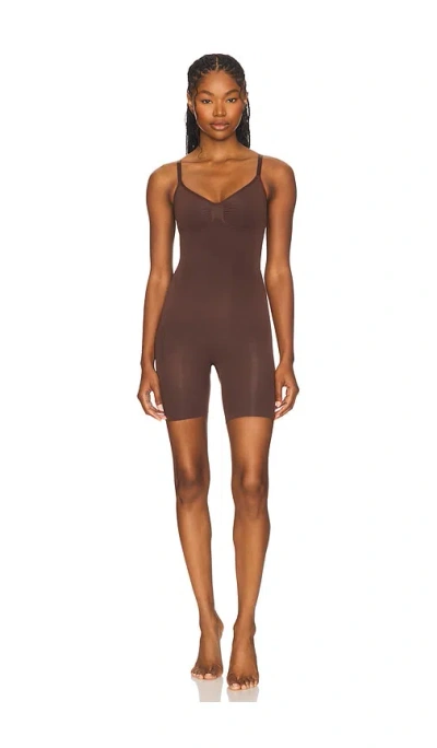 Skims Seamless Sculpt Mid Thigh Bodysuit In Brown