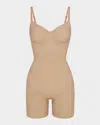 Skims Sculpting Seamless Mid-thigh Bodysuit In Clay