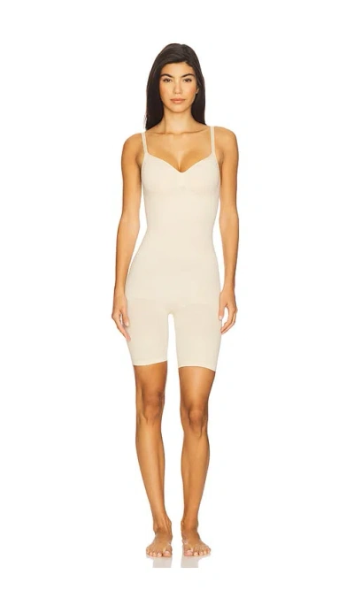 Skims Seamless Sculpt Mid Thigh Bodysuit In Sand