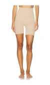 Skims Seamless Sculpt Mid Thigh Shorts In Brown