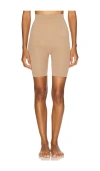 Skims Seamless Sculpt Mid Thigh Short In Brown