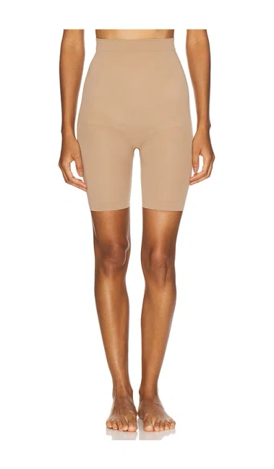 Skims Seamless Sculpt Mid Thigh Short In Brown