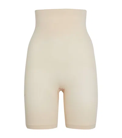 Skims Seamless Sculpt Mid-thigh Shorts In Nude