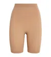 Skims Seamless Sculpt Mid Thigh Short In Nude