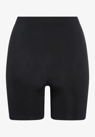 Skims Seamless Sculpt Mid-thigh Shaping Shorts In Black