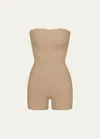 Skims Seamless Sculpt Strapless Shortie Bodysuit In Clay