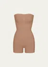 Skims Seamless Sculpt Strapless Shorts Bodysuit In Sienna