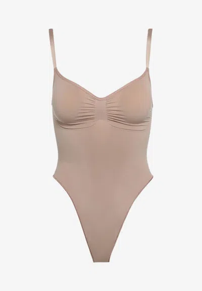 Skims Seamless Sculpt Thong Bodysuit In Beige