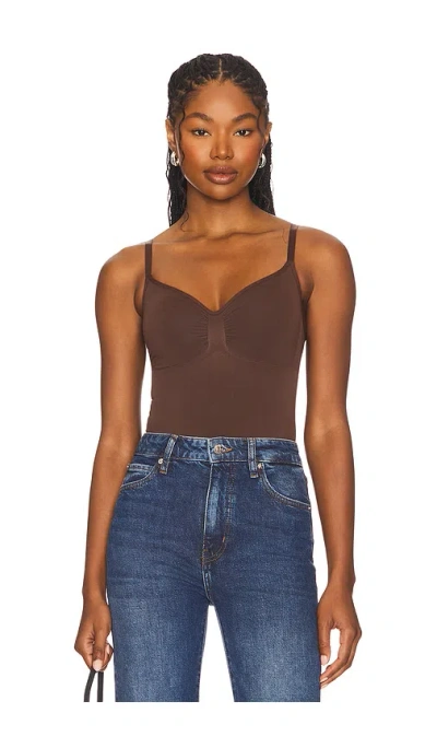 Skims Seamless Sculpt Thong Bodysuit In Brown