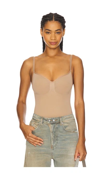 Skims Seamless Sculpt Thong Bodysuit In Brown