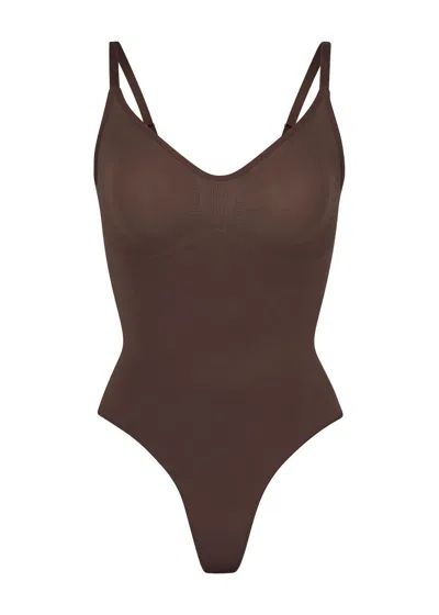 Skims Seamless Sculpt Thong Bodysuit In Brown