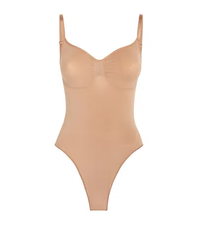 Skims Seamless Sculpt Thong Bodysuit In Brown