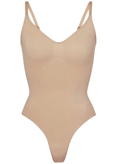 Skims Seamless Sculpt Thong Bodysuit In Sand