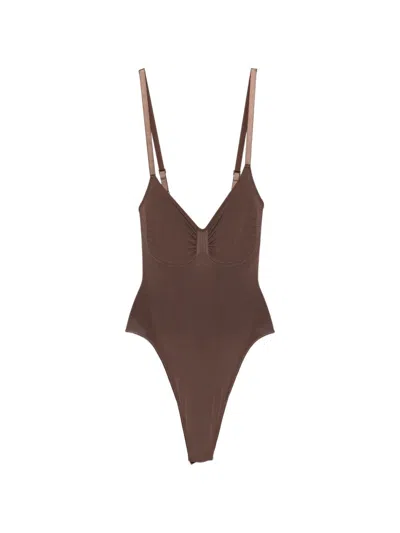 Skims Seamless Thong Bodysuit In Brown