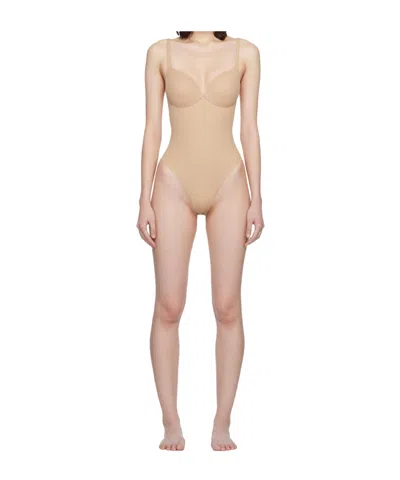 Skims Sleeveless Bodysuit In Gold