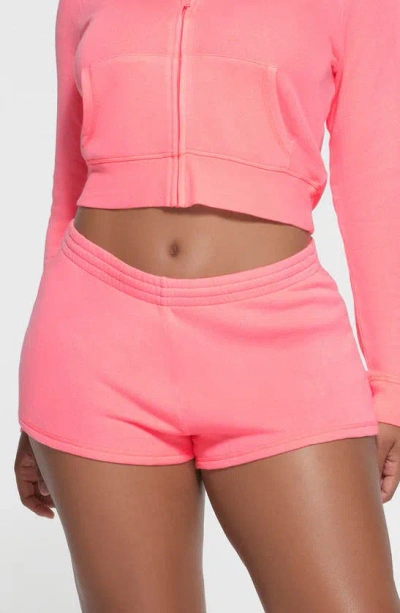 Skims Sport French Terry Loose Shorts In Coral