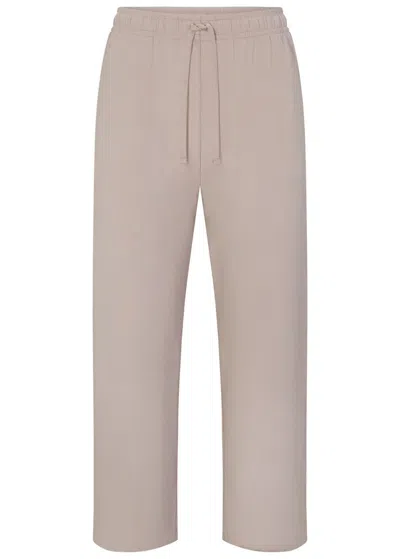 Skims Straight-leg Jersey Trousers In Neutral