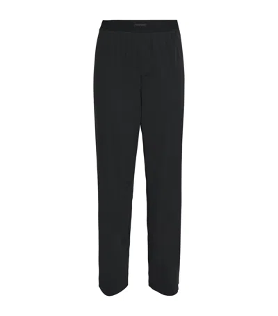 Skims Stretch-cotton Ribbed Trousers In Black