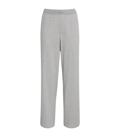 Skims Stretch-cotton Ribbed Trousers In Gray