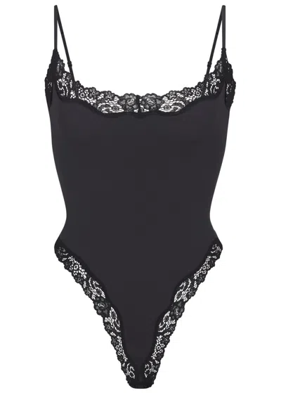 Skims Fits Everybody Lace-trimmed Stretch-jersey Thong Bodysuit In Onyx