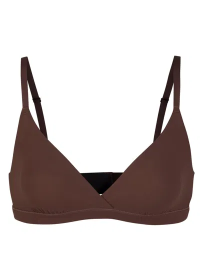 Skims Stretch-jersey Crossover Bralette In Burgundy