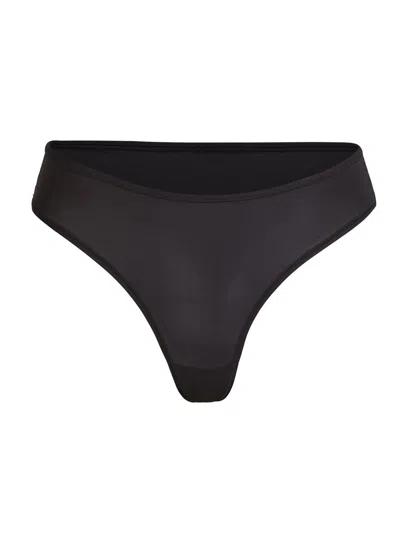 Skims Stretch-jersey Thong In Black
