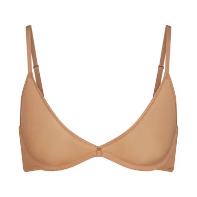 Skims Weightless In Ochre