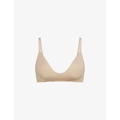 Skims Womens Sand Wireless Form Logo-embossed Padded Stretch-cotton Bra