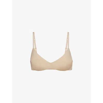 Skims Womens Sand Wireless Form Logo-embossed Plunge Stretch-cotton Bra