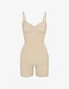 Skims Seamless Sculpt Strapless Shortie Bodysuit In Sand