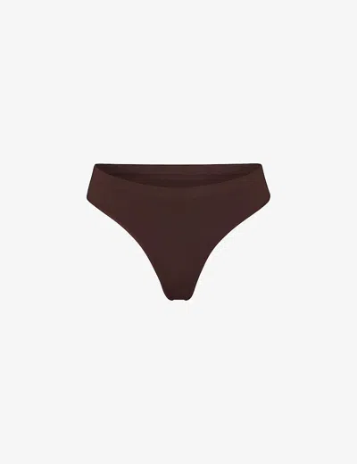 Skims Smoothing Mid-rise Stretch-woven Thong In Cocoa