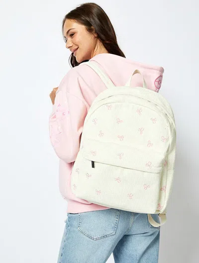 Skinnydip London Bow Embroidered Backpack In Cream In White