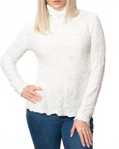 Sno Skins Dreamcatcher Turtleneck Top In Ivory In White