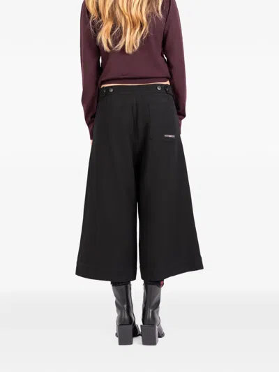 Société Anonyme Button-detail Cropped Trousers In Black