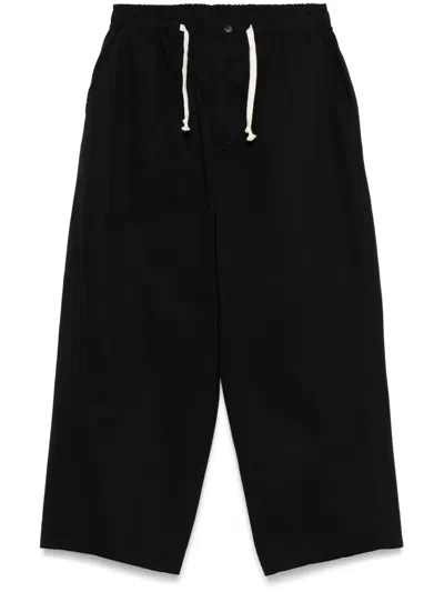 Société Anonyme Logo-embroidered Tapered Trousers In Black
