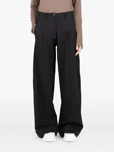 Société Anonyme Pleated Logo-embroidery Trousers In Black