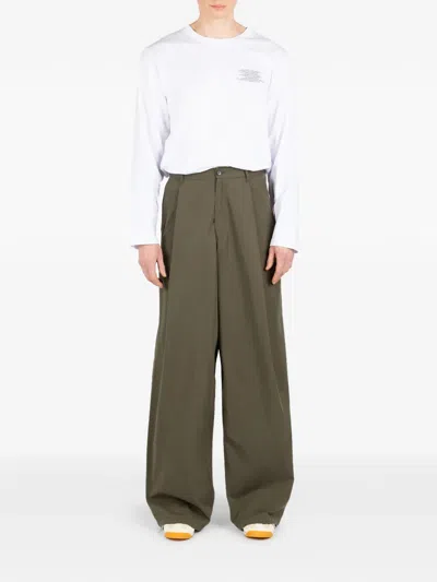 Société Anonyme Pleated Trousers In Green
