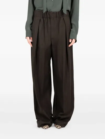 Société Anonyme Pleated Wide-leg Trousers In Brown