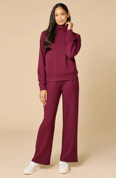 Softies Athleisure Mock Neck And Pleated Pant Set In Burgundy