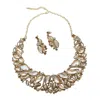 Sohi Stones Crystal Necklace Set In Gold