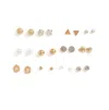 Sohi Gold-toned White Contemporary Studs Earrings In Gold