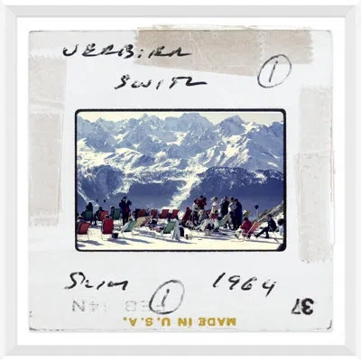 Soicher Marin 'lounging In Verbier - Slide' By Slim Aarons - Picture Frame Photograph On Paper In Blue;black;white;red