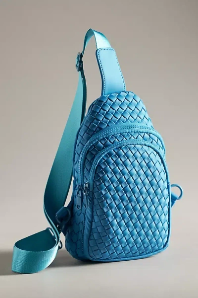 Sol And Selene Neoprene Sling Bag In Blue