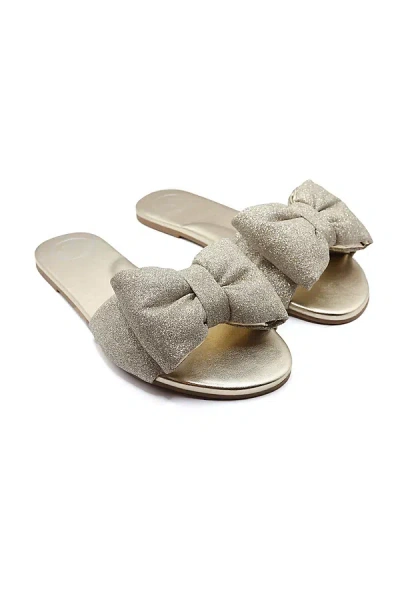 Solei Sea Rafie Bow Slide Sandals In Gold