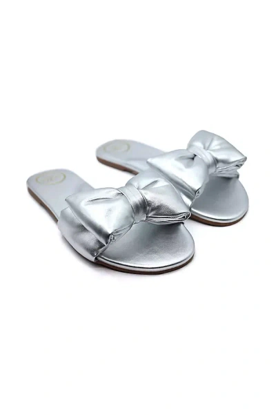 Solei Sea Rafie Bow Slide Sandals In Silver