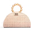 Soli & Sun The Isabella Tan Rattan Solihiya Weave And Gold Bead Top Handle Statement Bag