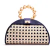 Soli & Sun The Isabella Tan Rattan Solihiya Weave And Gold Bead Top Handle Statement Bag In Blue