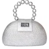 Soli & Sun The Orla Woven Straw & Wooden Bead Statement Clutch Bag